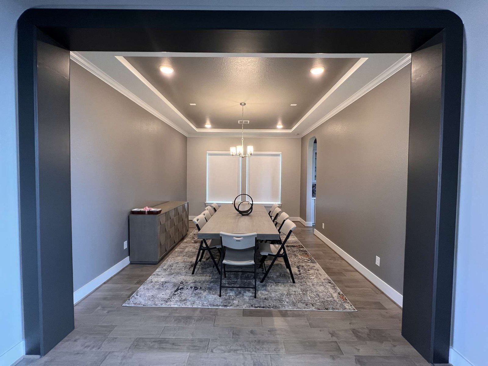 A beautifully painted home dining room interior in downtown Houston