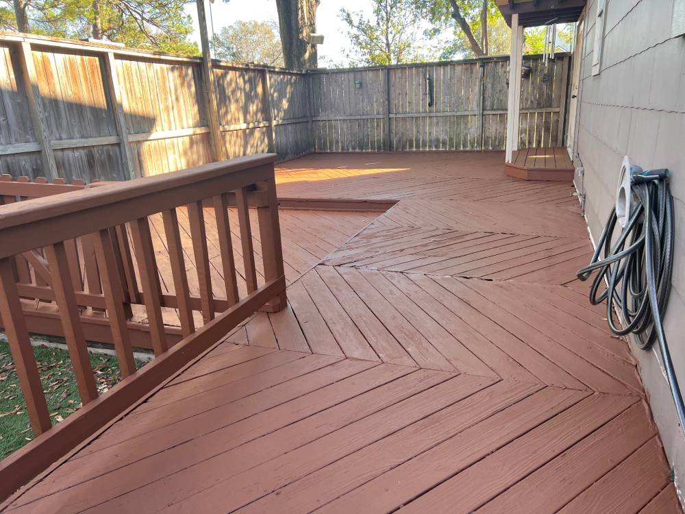 A rich brown painted wooden deck
