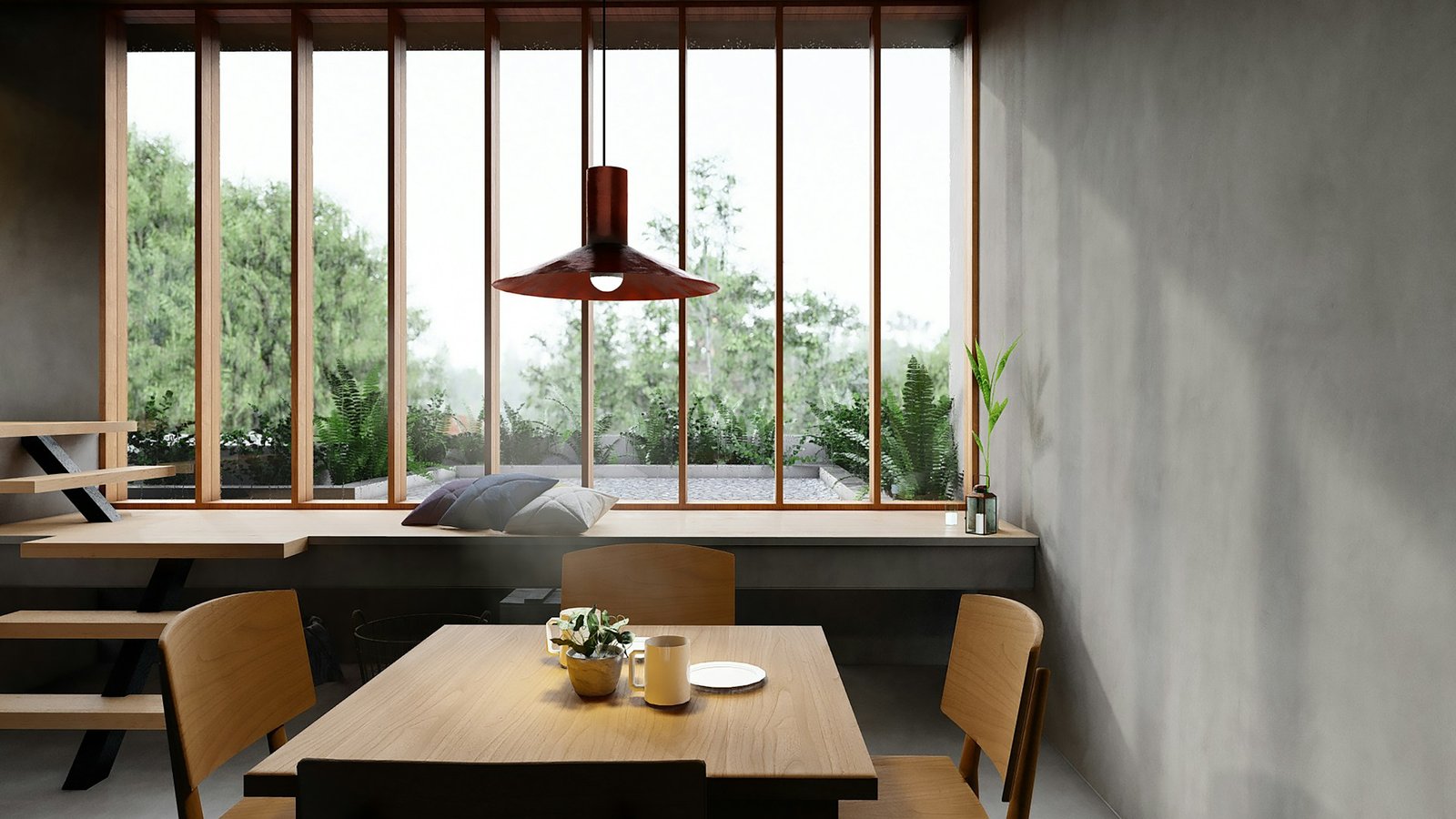 A room with gray walls and a wooden table with chairs