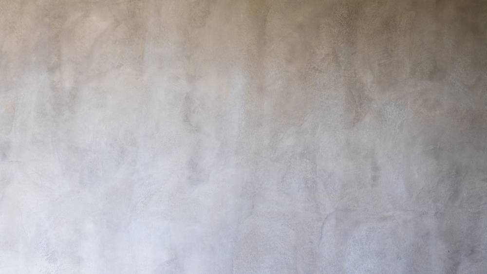 A limewashed concrete wall