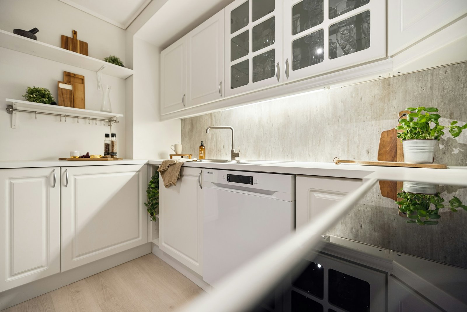 A kitchen with a limewash backsplash