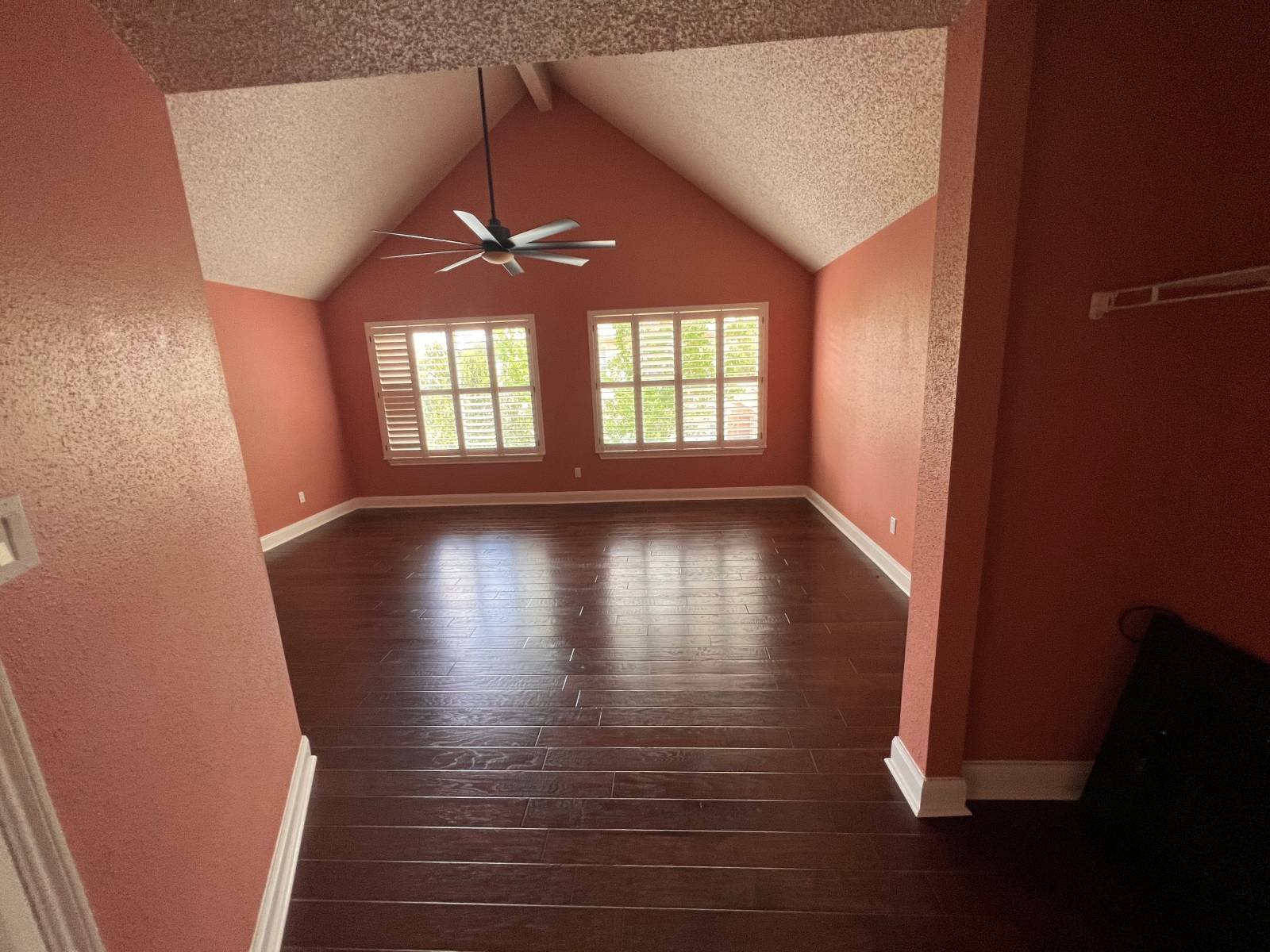 home-painters-cinco-ranch A freshly-painted salmon-colored interior room of a Houston home