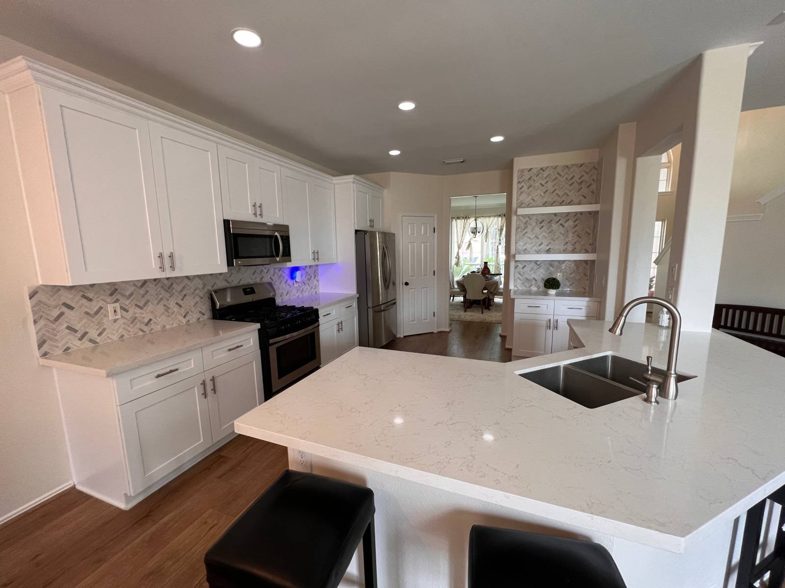 home-painters-medical-center A home kitchen with crisp white-painted walls and cabinets