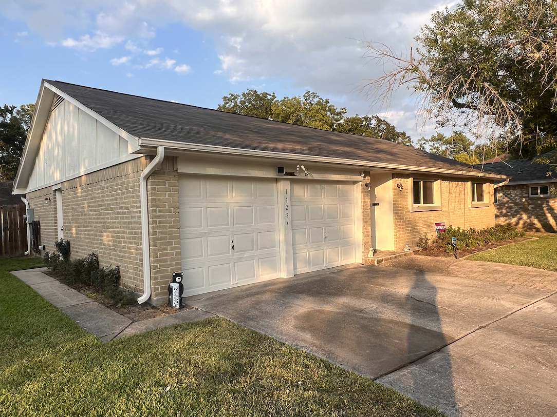 home-painters-kingwood Freshly painted garage doors as part of a residential painting project in Houston